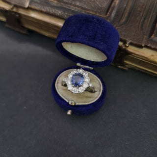 Platinum 1.3ct Diamond And 2ct Blue Sapphire Cluster Ring