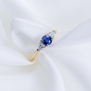 18ct Yellow Gold Blue Sapphire And Pear Cut Diamond Trilogy Ring
