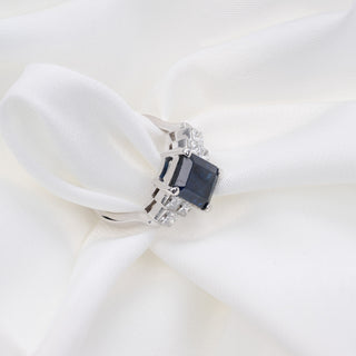 18ct White Gold 2.5ct Sapphire & 0.75ct Princess Diamond Trilogy Ring