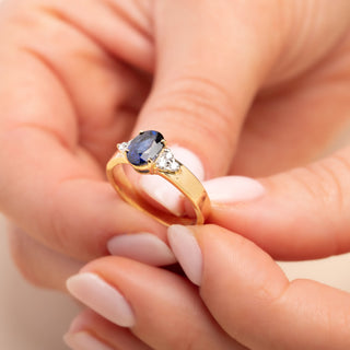 18ct Yellow Gold 1.3ct Oval Cut Sapphire & 0.15ct Diamond Trilogy Ring