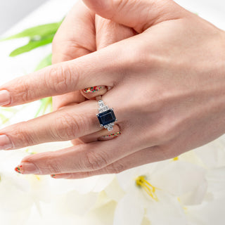 18ct White Gold 2.5ct Sapphire & 0.75ct Princess Diamond Trilogy Ring